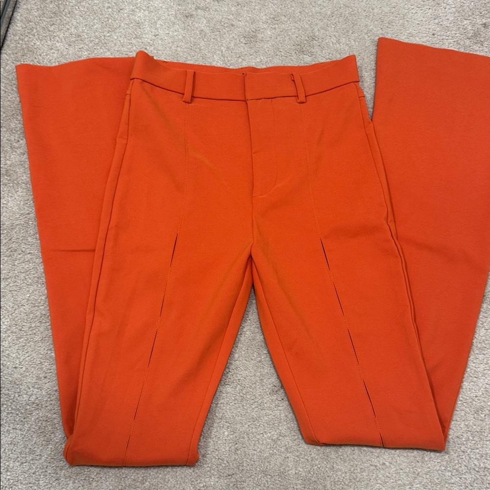 Vibrant Orange Flare Pants with 70s-Inspired Boot Cut